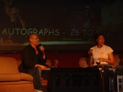 Hercules' Michael Hurst enjoys a joke with the audience as authoress & interviewer Thomasina Gibson tries to get her point across